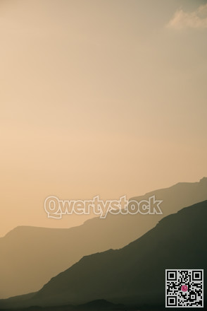 Calm sky with layered peaks. Contemporary interior visual with soft gradients and atmospheric depth