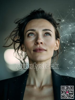 Female executive visualizing innovative solutions surrounded by abstract nodes and glowing bokeh effects