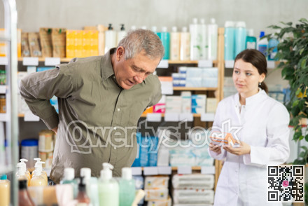 Senior man visits pharmacy and suffers from backache. Girl pharmacist offer help