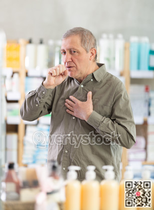 Senior man visits pharmacy and suffers from cough