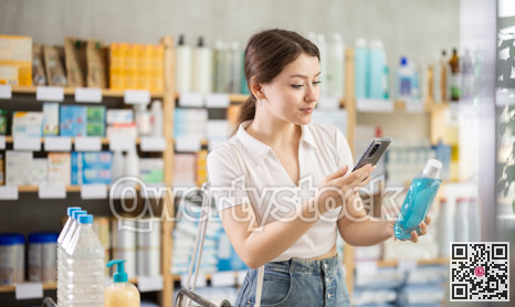 Young woman scanning qr code of mouthwash