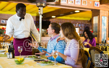 Couple dissapointed by food in restaurant and quarreling with waiter