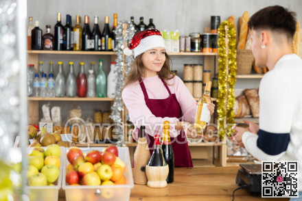 Young woman seller offers cheese to man