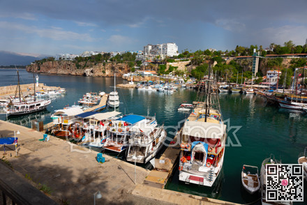 ANTALYA, TURKEY - MAY 15, 2022: Picturesque landscape of the resort town with a view of the port