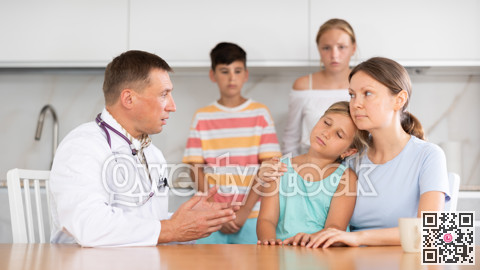 Doctor examinating pre-teen girl