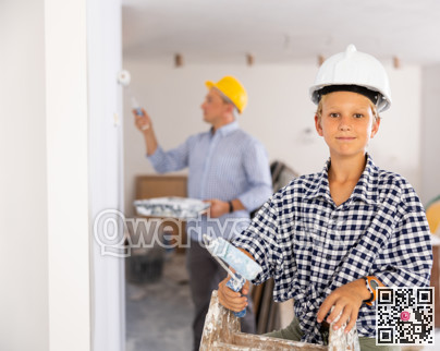 Boy posing with tools for home renovation