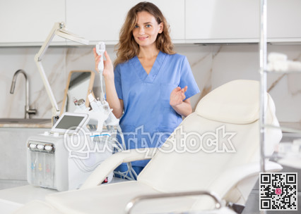 Skilled cosmetic doctor confidently stands