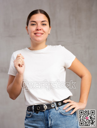 Smiling young woman in casual clothes gesturing