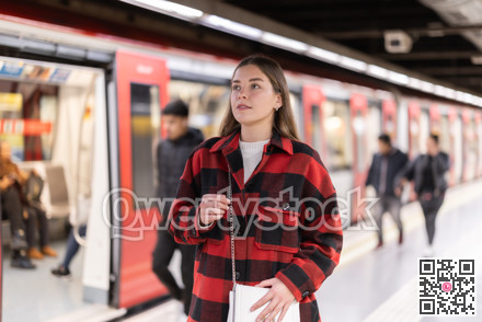 Woman changing to the subway