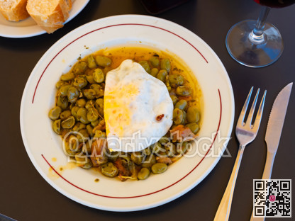 Spanish beans with egg in a plate