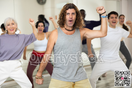Group of multinational people practicing new modern dance techniques