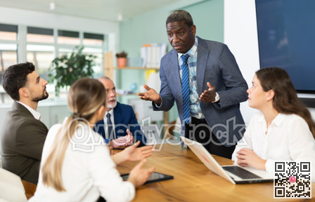 African businessman holds a meeting for employees
