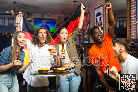 Enthusiastic German fans scream with joy in beer bar. Germany victory