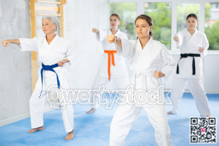 Athletes have starting position and repeating sequence of punches and painful techniques in kata