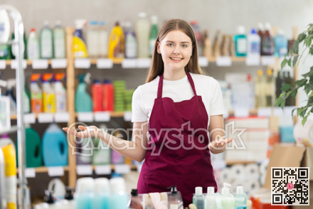 Friendly sales girl invites you to visit hardware store