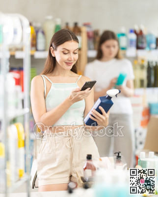 woman scanning spray barcode on her phone