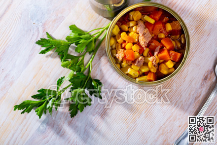 Opened can of Milanese salad