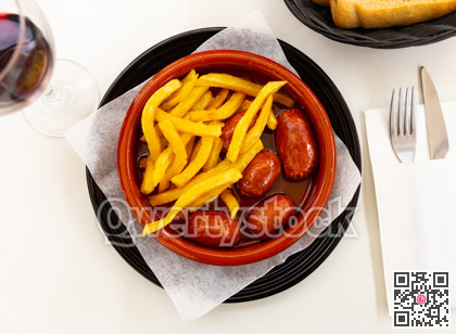 Popular Spanish tapa of smoked chorizo cooked in cider