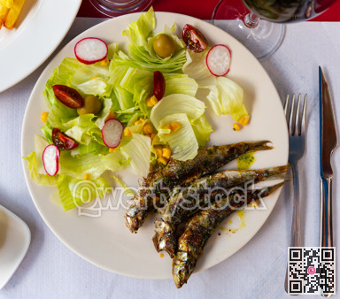 Roasted sardines with vegetable salad