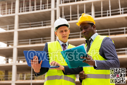 Engineers standing on construction site