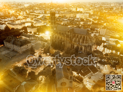 Historical aerial view of Limoges Cathedral illuminated at dusk,