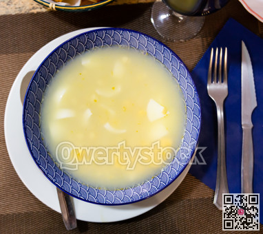 Soup is made from chicken broth, chopped boiled eggs and spices