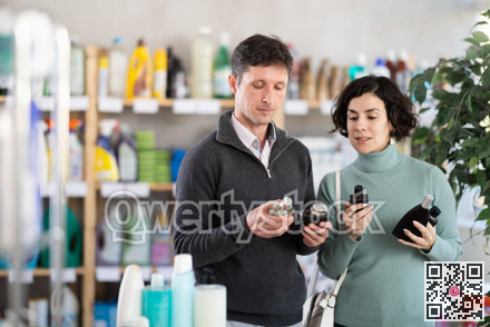 Couple sniffs fragrance of perfume, chooses scent spray with pleasant smell