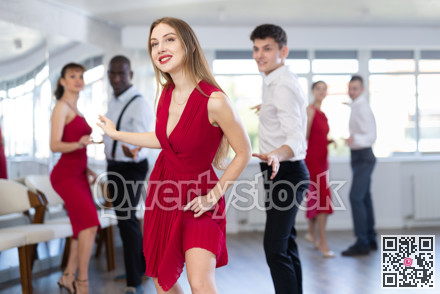 Woman dances incendiary boogie woogie with man partner during choreography lesson