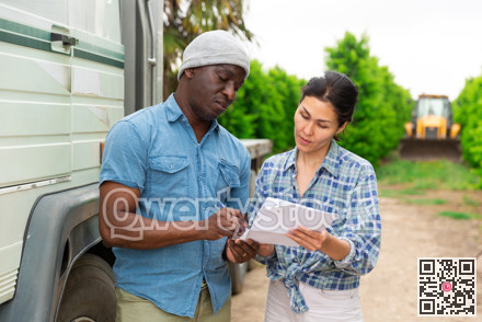 Man and woman are talking about trucking