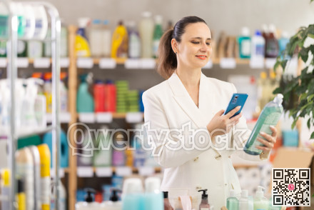 Adult woman scanning qr code for dishwashing