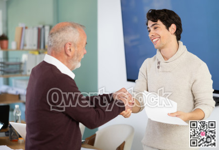 Confirmation of successful business negotiations with kind handshake, businessperson shaking hands and closing deal