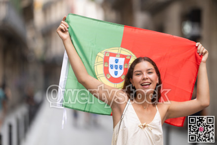Young woman with Portuguese flag on city street