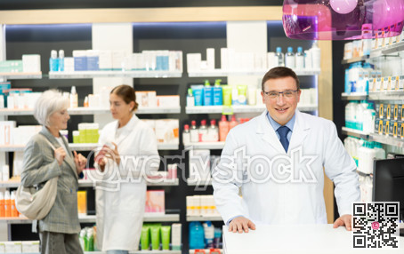 At pharmacy, man apothecary waiting for clients and invites with gesture go to chemist shop