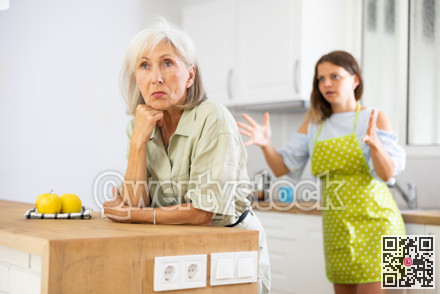 Offended old woman quarreling with her daughter at home