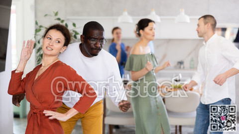 Friends man and woman dancing active dance