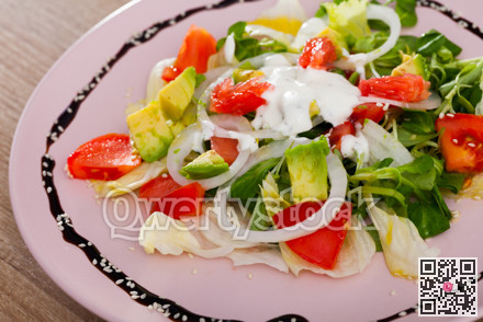 Deliciously salad of avocado, grapefruit, tomatoes and corn salad