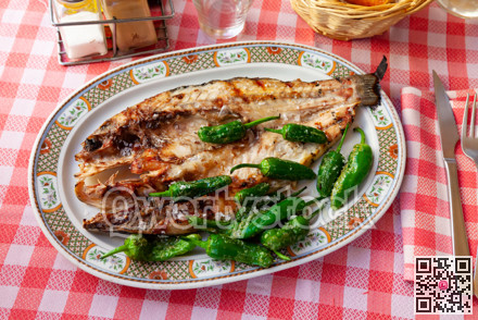 Grilled sea bass with peppers