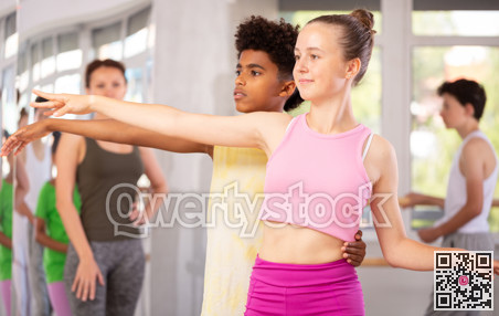 Couple boy and girl teenagers rehearsing ballet