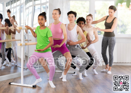 Teenage girl practicing plie position of ballet during choreography classes