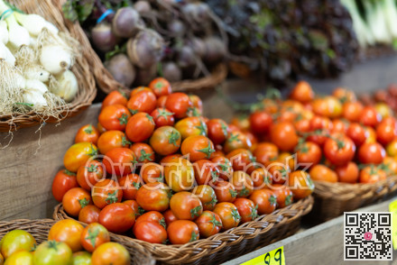 Eco products store counter with large assortment of tomatoes for salent
