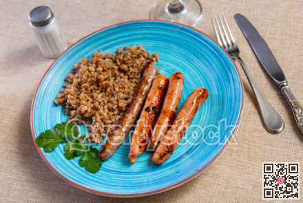 Fried pork or chicken homemade sausage and porridge buckwheat