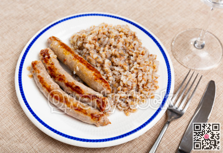 Fried pork or chicken homemade sausage and porridge buckwheat