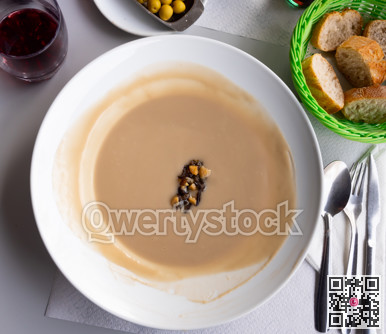 Hot mushroom cream soup of champignons