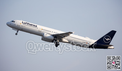 German airline aircraft Lufthansa is taking off, board of is in air with gear-extended