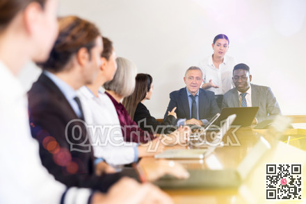 Business persons discussing work plan in meeting room