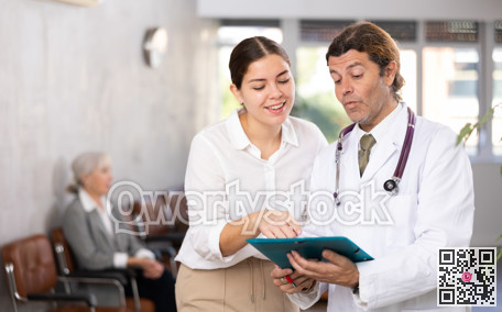 Attentive doctor prescribing tests to patient of clinic to check state of health