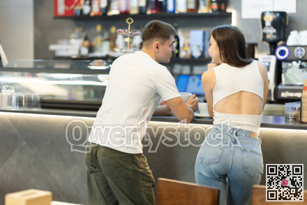 Couple at bar counter, back view