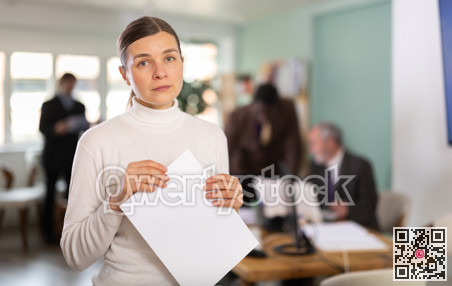 Portrait of businesswoman during a meeting in company office