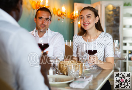 Couple and their friend in the restaurant