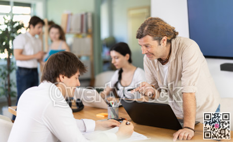Several managers work together in a modern office. Well-coordinated management team